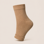 Beige ankle compression sleeve providing support for ankle pain, swelling, and daily comfort