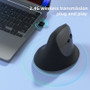 Side view of ergonomic vertical mouse showing natural handshake grip position to reduce wrist and forearm strain