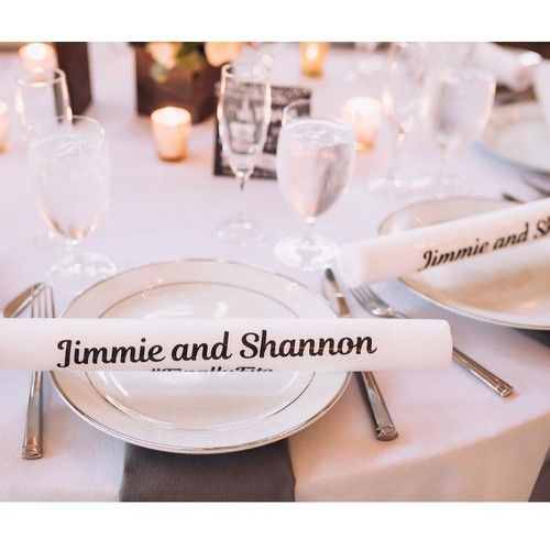 Customized LED Foam Glow Sticks, flashing foam sticks on a decorated wedding table setting with plates, glasses, and candles at a celebration event.