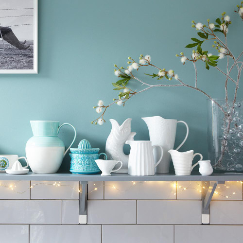 16.5 Ft Fairy Wire with 100 Warm White LEDs, Waterproof AA Battery Pack with Remote, decorative fairy light on a vase with flowers in a stylish home decor setting.