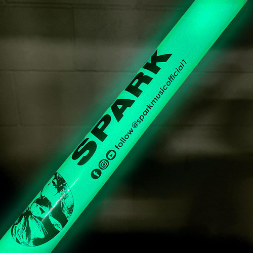 Customized 7 Mode LED Foam Glow Sticks, flashing foam sticks emitting bright green glow with promotional text and contact information.