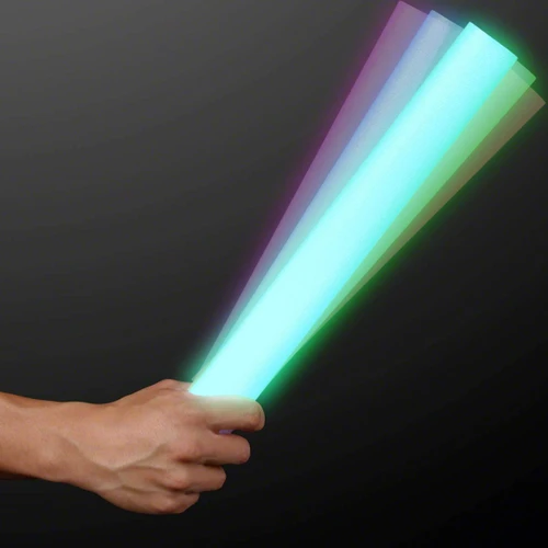 flashing foam sticks emitting bright neon green, blue, and purple lights in a dark environment