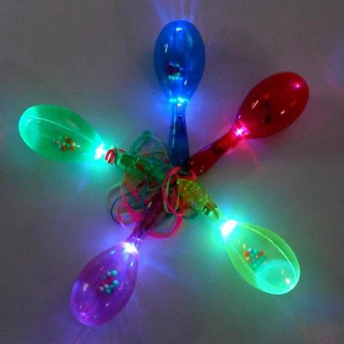 Lighted Flashing Maraca (Close Out), colorful LED flashing maracas with small bead decorations inside, illuminated in various colors like blue, green, red, and purple.