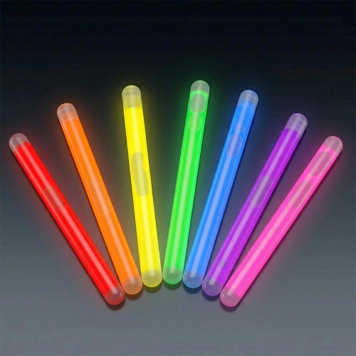 4 inch Slim Lightsticks, colorful glow sticks in red, orange, yellow, green, blue, purple, and pink, illuminated in darkness for parties and events.