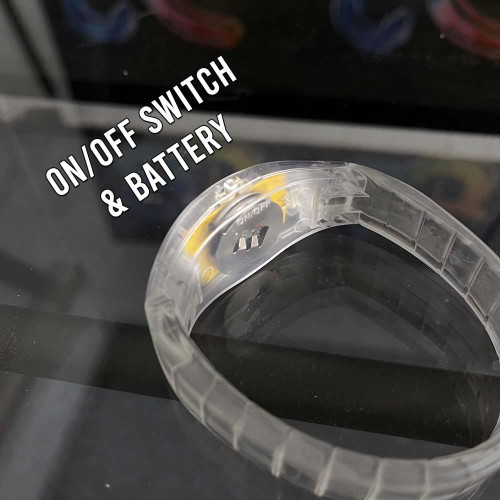 transparent plastic bracelet with on/off switch and battery compartment for customizable wear