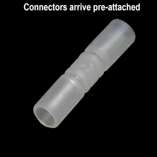 multiple plastic glow necklace connectors on a black background