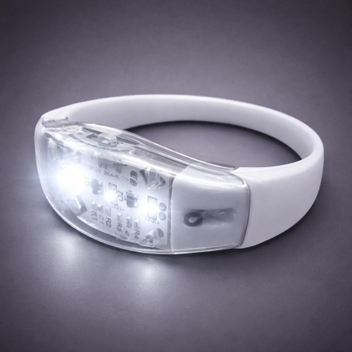 Sound Activated LED Silicone Bracelet, illuminated LED silicone wristband with visible electronic components for light display.