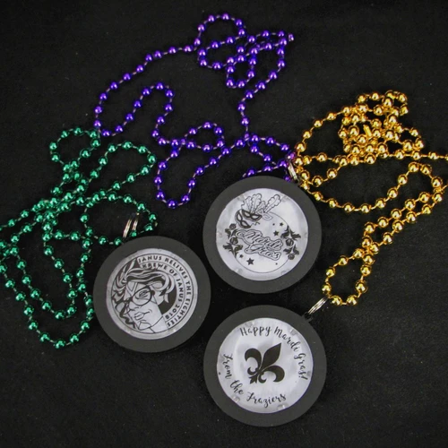 Customized Beaded Mardi Gras Flashing Medallions, colorful beaded necklaces with Mardi Gras themed medallions on a black background.