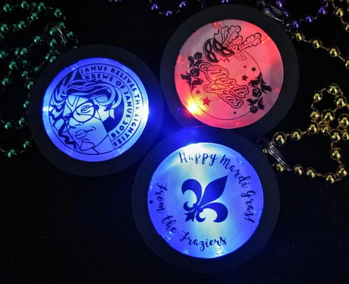 Customized Beaded Mardi Gras Flashing Medallions, illuminated LED lighted medallions with Mardi Gras themed designs and greetings.