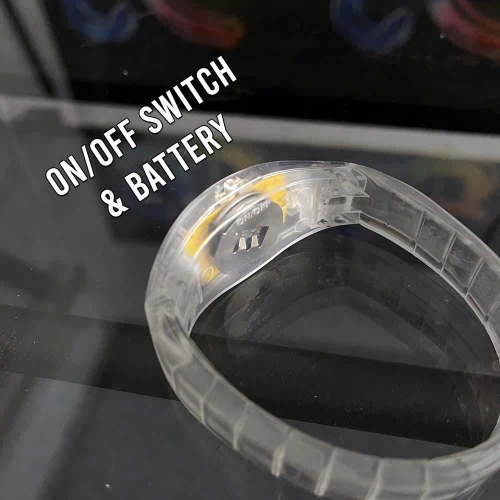 Custom Printed Light Up Click Bracelet, transparent plastic bracelet with on/off switch and battery compartment.