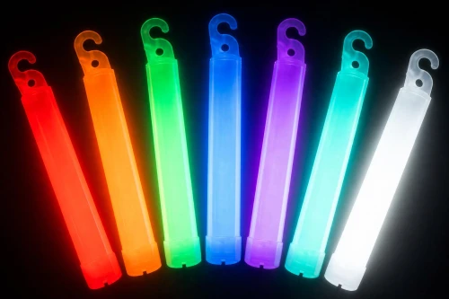 6-inch Revolution lightsticks fanned out in multiple colors, glowing with intense flare