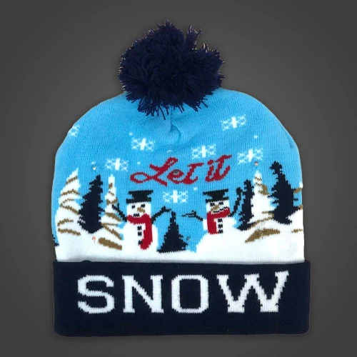 LED Beanie Snow Scene Sock Hat, blue winter hat with snowmen, trees, and snowfall design, featuring a large pom-pom on top and the words 'SNOW' on the brim.