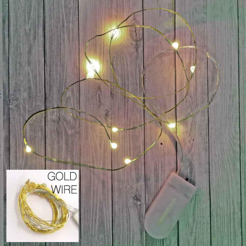 78 Inch Fairy Wire 20 LEDs, product image showing a long, flexible golden wire string of fairy lights with 20 LED bulbs, powered by coin cell battery pack with replaceable batteries, placed on wooden background.