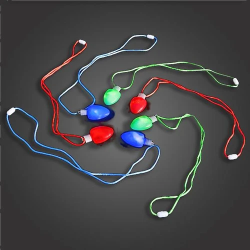 colorful string lights with large LED bulbs in red, blue, and green on black background