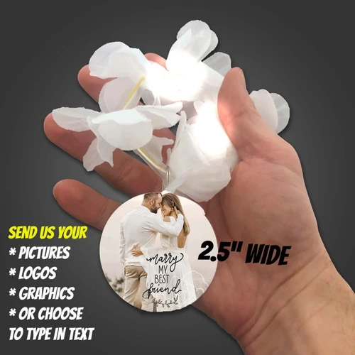 Customized Light Up Floral Lei with Full Color Medallion Blank, a white floral lei with built-in lights and a customizable medallion for personalized messages or logos.