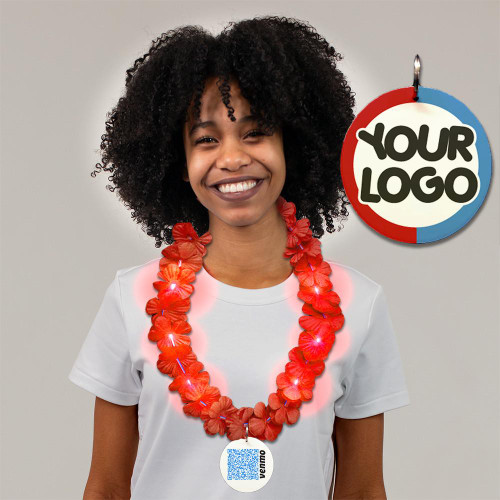 woman wearing the light-up lei and smiling, with a large promotional medallion with logo
