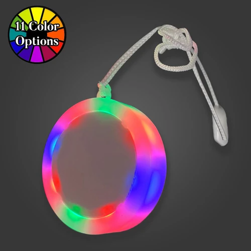 Luminous Arc Medallion LED Necklace, illuminated circular pendant with rainbow colors and white adjustable cord.
