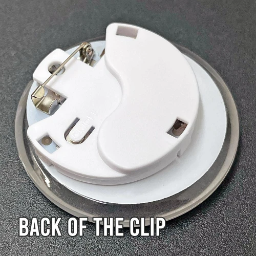 Personalized Multicolor Flashing Light Up Pin-on LED 2" Circle Badge, back of the clip showing the pin and battery compartment.