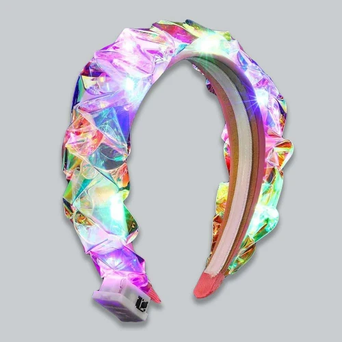 Light-Up Braided Plastic Headband, iridescent and colorful headband with embedded LED lights for added illumination.