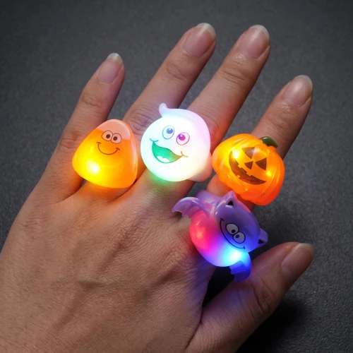 Assorted LED Halloween Plastic Rings, colorful glowing Halloween rings with spooky and fun pumpkin, ghost, bat, and smiley face designs.