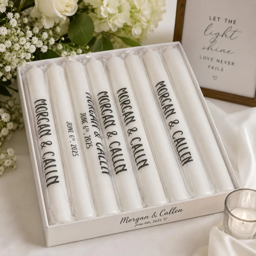 set of white illuminated foam sticks with personalized black text for wedding celebration