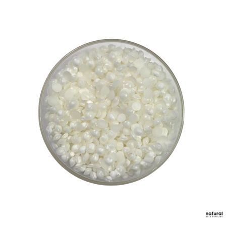 This image shows Emulsifying Wax NF in the form of small, off-white beads or pastilles. It is a vegetable-based emulsifier used in cosmetic formulations to create stable oil-in-water emulsions. Commonly incorporated in products like lotions, creams, salves, ointments, and gels, Emulsifying Wax NF binds water and oil together for smooth, consistent textures. Odorless and easy to work with, it’s a versatile ingredient favored by both DIY makers and professional cosmetic chemists