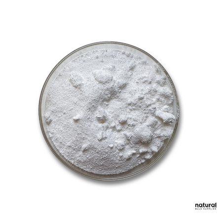 A clear dish containing fine white Disodium EDTA powder. The texture appears smooth, indicating high purity. This chelating agent is commonly used in cosmetic formulations to improve stability by binding metal ions, prolonging product shelf life and efficacy. A clear dish containing fine white Disodium EDTA powder. The texture appears smooth, indicating high purity. This chelating agent is commonly used in cosmetic formulations to improve stability by binding metal ions, prolonging product shelf life and efficacy.