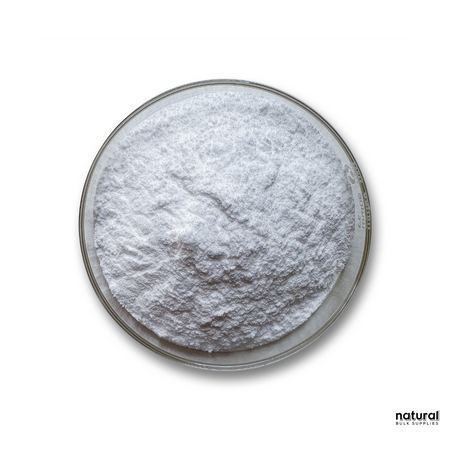 A close-up image of a fine white powder, displayed in a glass dish on a white background. The powder appears soft and well-textured, emphasizing its purity and high quality. This ingredient is typically used in cosmetic formulations for its preservative or moisturizing properties. The minimalist presentation highlights the natural, eco-friendly nature of the product. The image is branded with the Natural Bulk Supplies logo in the lower right corner, reinforcing the source of this premium cosmetic ingredient. A close-up image of a fine white powder, displayed in a glass dish on a white background. The powder appears soft and well-textured, emphasizing its purity and high quality. This ingredient is typically used in cosmetic formulations for its preservative or moisturizing properties. The minimalist presentation highlights the natural, eco-friendly nature of the product. The image is branded with the Natural Bulk Supplies logo in the lower right corner, reinforcing the source of this premium cosmetic ingredient.