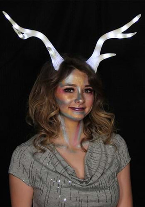 Light-Up Deer Antler White LumenHorns- glowing antlers worn by female model