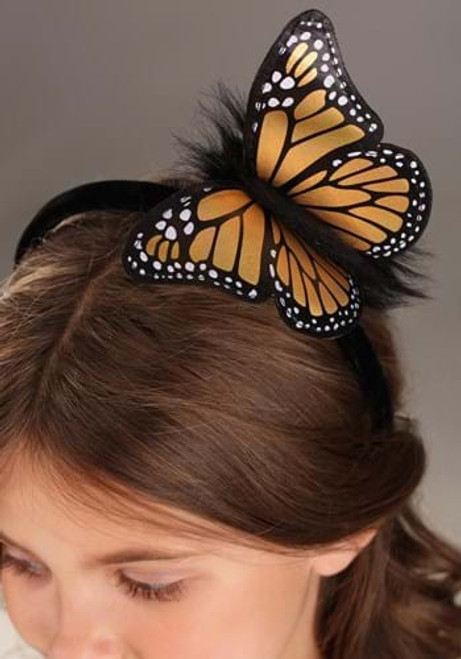 Springy Monarch Butterfly Headband- worn by model close up