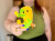 acid reflux plushie held by model