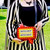 Beetlejuice Graveyard Sign Glow In The Dark Crossbody Bag- worn by model