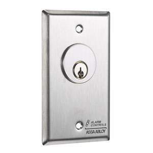 HES MCK-4-3 momentary switch close-up showing stainless steel construction and durability