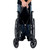A person folds a black wheelchair by grasping its seat fabric, showcasing its compact design for easy storage or transport. A person folds a black wheelchair by grasping its seat fabric, showcasing its compact design for easy storage or transport.