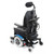 Rear three-quarter view of the Invacare Rovi X3 power wheelchair showing the adjustable seating system, headrest, and narrow mid-wheel drive power base.