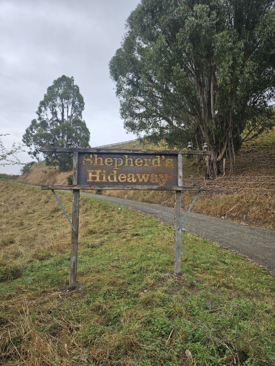 Rustic custom Shepherds Hideaway roadside sign