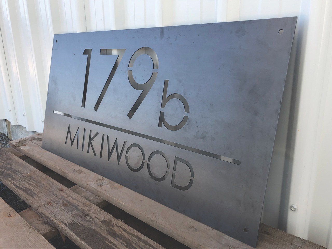 Custom Mikiwood metal address sign with the number 179B