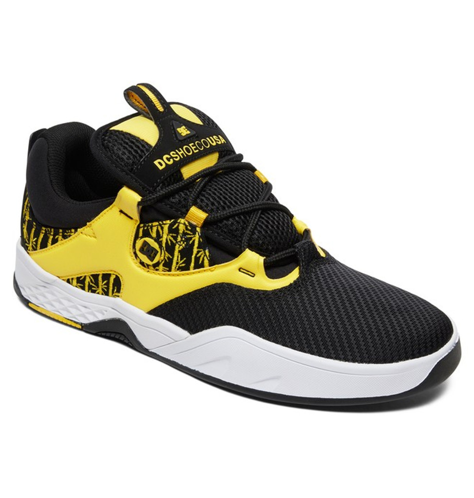 black and yellow dc shoes