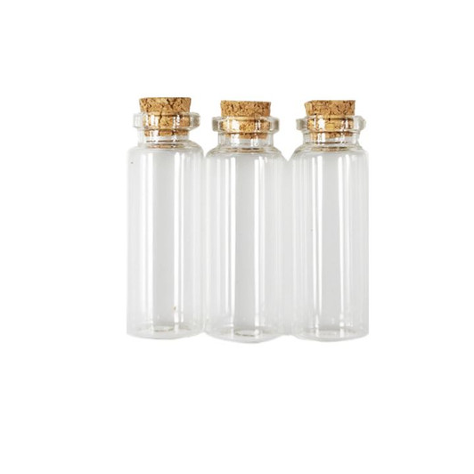 Small Clear Glass Bottles With Cork Closure Tops, Packaging, cosmetics, oils, Party Crafts and Multipurpose Organizers. Small Clear Glass Bottles With Cork Closure Tops, Packaging, cosmetics, oils, Party Crafts and Multipurpose Organizers.