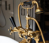 Black and brass taps from Aston Matthews