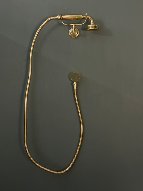 Astonian Signature Handshower Kit with wall outlet, hose, handshower and wall antler - Unlacquered Polished Brass