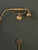 Astonian Signature Handshower Kit with wall outlet, hose, handshower and wall antler - Unlacquered Brushed Brass