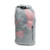 a photo of the gray roll-top dry stuff sack sitting vertically with a sleeping quilt/ sleeping bag stuffed inside