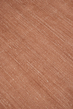 Close-up of Vara rug in Terra, showing silk-wool tactile contrast