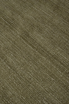 Close-up of Vara rug in Olive, showing silk-wool tactile contrast