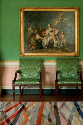 Carnival Round Rug by Paul Smith - rug in a green room
