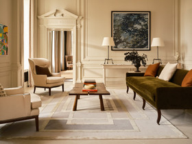 David Rockwell Platinum Metallic rug shown in full, anchoring a drawing room seating group around a live-edge coffee table