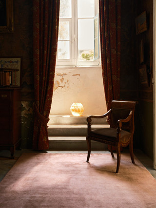 Mohair Sheared rug in Orchid, styled in a sunlit doorway setting