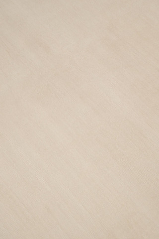 Close-up of Caliche Silk rug in Dawn, showing lustrous silk sheen
