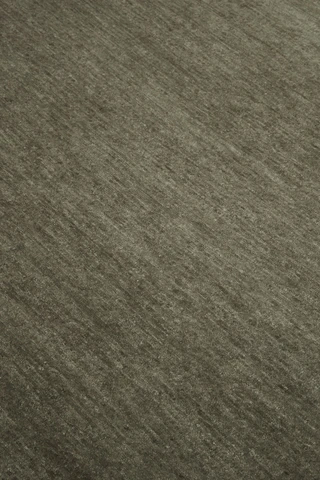 Close-up of Doma rug in Forest, showing wool-silk blend texture